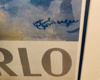 Lot 9299.  $120.00. Framed Monte  Poster 32"W x 47.5" H.  Interesting French image of Jean Gabriel Domergue's now iconic nude flower girl that was created as a travel poster for Monte Carlo, c. late 1940's-1950's.  The French painter (1889-1962 ) specialized in portraits of Parisian women, many nude hiding beside or behind something like this one, and he claims to have been the self-proclaimed "inventor of the pin-up" - i.e. he also painted Brigitte Bardot.  