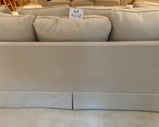 Lot 9012. $1,395.00 Vanguard American Bungalow Main Street Sofa in  cream Color, Purchased at Toms-Price.  Includes:  4 pillows, rolled arms, high-end fabric.  86" W  x 35" Deep,  We think it is down and very comfy. 