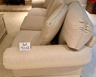 Lot 9012. $1,395.00 Vanguard American Bungalow Main Street Sofa in  cream Color, Purchased at Toms-Price.  Includes:  4 pillows, rolled arms, high-end fabric.  86" W  x 35" Deep,  We think it is down and very comfy. 