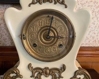 Antique mantel clock $475
