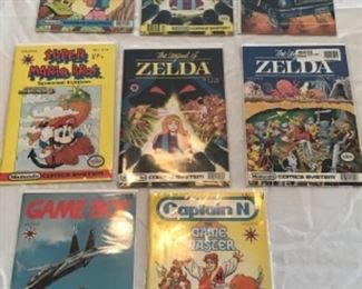 Comic books Zelda and Mario brothers. In sleeves.