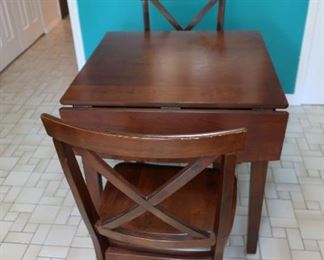 drop  leaf table  with  two  chairs