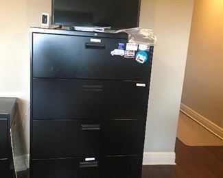 4 drawer lateral cabinet and a Samsung TV with remote