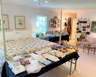 King size painted four poster bed, vintage linens