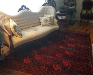 One of several nice Victorian Sofas, Antique Afghan Elephant Foot Rug (1910) in excellent shape and great color.