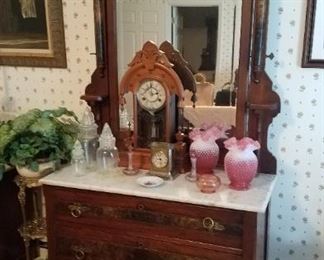 Walnut Victorian dresser to match bed and washstand, antique clocks, hobnail vases, matching jars, 