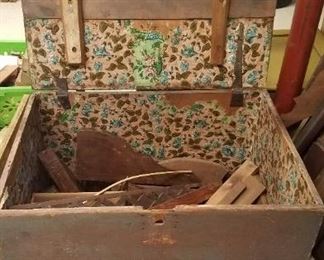 Early blanket box...note hinges and wallpaper