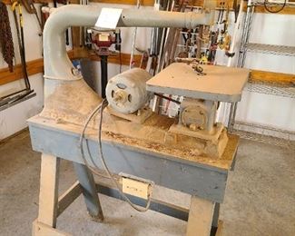 Heavy metal scroll saw with large extended arm