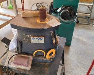 Spindle sander on stand.  Bandsaw is sold