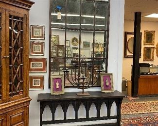 Large mirror by uttermost with distressed glass, Gothic style console table, five arm iron candelabra by Jan Barboglia 