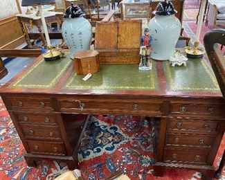 Beautiful embossed leather top partners desk.