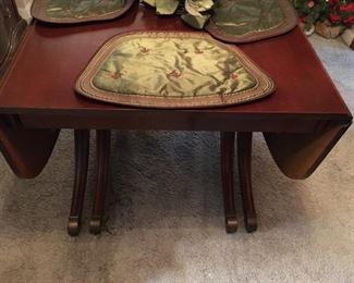 drop leaf table w/ 4 leaves (and pads) and 6 chairs