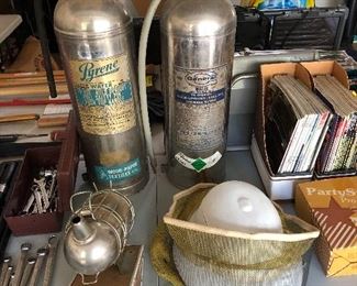 Vintage fire extinguishers and bee keepers equipment