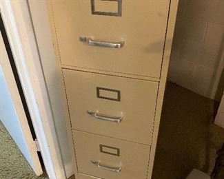 One of several filing cabinets.