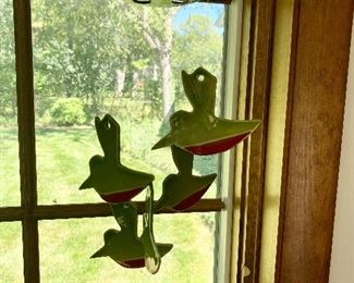 Ceramic bird wind chimes.