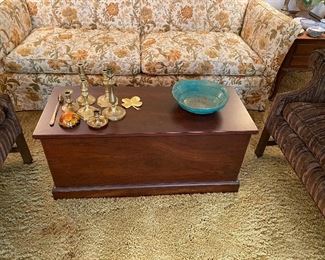 Solid wood cedar lined storage chest coffee table.
