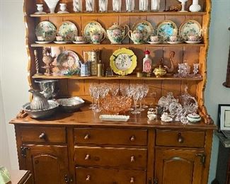 Two piece china cabinet filled with beauty!