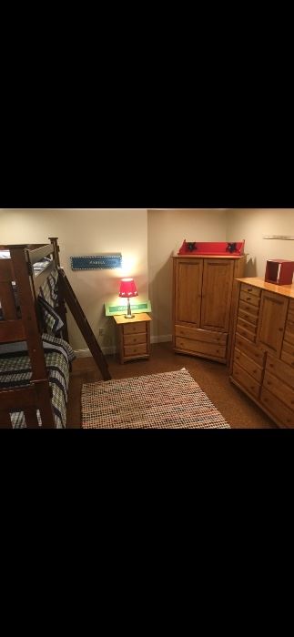Pottery barn bunk beds, area rug, gaming/tv cabinet, bedside table and chest with drawers.