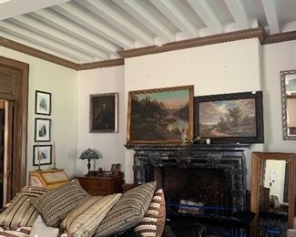 Feather down pillows, curved armed sofas, Chicago art, English paintings