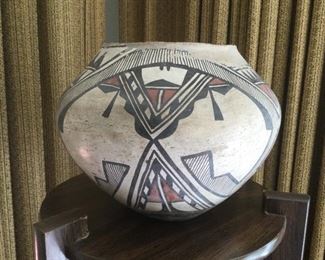 American Indian Brown & Red Decorated Pottery (cracked).  Possibly 1910 Acoma.  $750  (bids accepted).  Approximately 11” at widest part.  Top opening is 6.5”.  