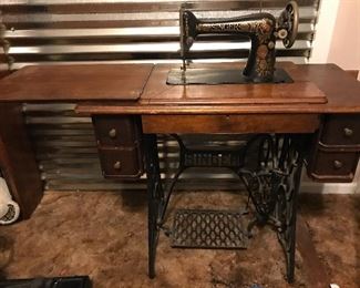 Singer sewing machine with wrought iron base