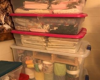 Lots of sewing supplies, thread, and other craft supplies