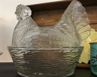 Large glass chicken in basket