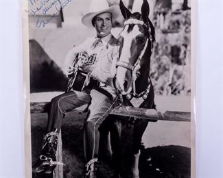 Autograph Signed Photograph of Gene Autry on Fence