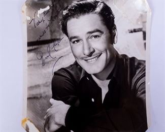 Autograph Signed Portrait Photograph of Errol Flynn