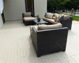 Outdoor all weather wicker sofa, pair of chairs, coffee and side tables