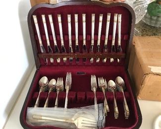 Set of Wallace Golden Aegean Weave Sterling Flatware Service for 24. (Missing one oval spoon)  - 24 dinner forks, 24 salad forks, 23 oval spoons, 48 teaspoons, 24 dinner knives, 1 sugar shell, 2 serving forks, 1 master butter, 1 slotted spoon, 1 serving spoon (149 pieces total)