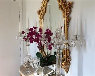 Gilded hall table with marble top and matching mirror; crystal candelabras