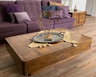 parquet coffee table, horse art, purple sectional