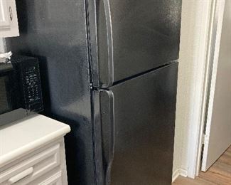 black Whirlpool refrigerator/freezer 