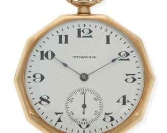 1001
A Gold Pocket Watch, Tiffany & Co
Dial: White circular dial with black Arabic numerals, sub-seconds dial, signed Tiffany & Co.
Movement:19J stemwind and set movement, jeweled gold chatons, nickel plated, damascened design, cut bi-metallic compensation balance, blued steel balance spring, jeweled straightline lever escapement, micrometric regulator, signed: Waltham / Mass. / Riverside, #23187356
Case: 14k yellow gold open face decagon shaped smooth polished case, signed: Wadsworth 14k Karat, #865767; with personalized engraved monogram
44 mm x 44 mm
59.3 grams
Estimate: $600 - $800