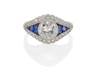 1015
An Art Deco Style Diamond And Sapphire Ring
Platinum
Centering a full-cut round diamonds, gauged at approximately 1.1ct and graded F-G color and VS clarity, flanked by six calibre-cut tapered sapphires and thirty-four full-cut round diamonds, totaling .5cts and graded G-H color and VS clarity
Ring size: 5
3.3 grams
Estimate: $4,000 - $6,000