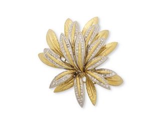 1024
A Diamond Foliate Brooch
18k yellow of white gold, stamped: Italy / 18k
The lovely three-dimensional sculptured foliage embellished by one hundred sixty-five single cut round diamonds, totaling approximately .6cts and graded G-H color and VS clarity
2.25" L x 1.75" W
32.2 grams
Estimate: $1,200 - $1,800