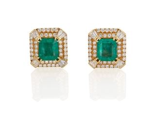 1035
A Pair Of Emerald And Diamond Ear Clips
18k yellow gold
Set with two rectangular-cut emeralds, totaling approximately 3.5cts, and surrounded by sixteen tapered baguette and eight full-cut round diamonds, totaling approximately 1.18cts and graded G-H color and SI clarity
.5" L x .5" W
10.2 grams
2 pieces
Estimate: $2,500 - $3,500