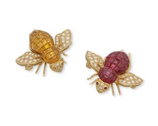 1048
A Pair Of Gemstone And Diamond Bee Brooches
18k yellow gold
Comprising a bee invisibly set with yellow sapphires and with wings set with small round diamonds and yellow sapphire eyes, and a matching bee with invisibly set rubies and wings set with small round diamonds and ruby eyes
1" L x 1.25" W
19.5 grams
2 pieces
Estimate: $2,000 - $3,000