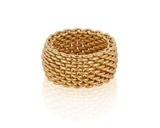 1047
A Tiffany & Co. Woven Gold Band
18k yellow gold, stamped: T & Co. / 750
Designed as an entirely woven band
Ring size: 7.25
12.8 grams
Estimate: $800 - $1,200
