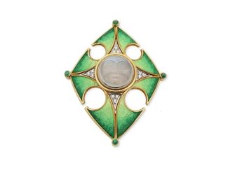 1052
A Silverhorn Moonstone, Enamel, And Gemstone Moon Face Brooch
18k yellow gold, stamped: [triangle for Silverhorn] / W / 18ct.
Centering a carved moonstone moon face, flanked by small pave-set diamonds ombre green enamel and terminating with cabochon emeralds
2.5" H x 2" W
26.4 grams
Estimate: $1,500 - $2,000