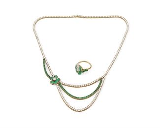 1057
Two Emerald And Diamond Jewelry Items
18k yellow gold
Comprising a flower necklace set with five pear-shaped and fifty-two round emeralds, totaling approximately 2cts, and further set with two hundred twenty-three full-cut round diamonds, totaling approximately 10.2cts and graded H-I color and VS-SI clarity (17" L x 2" H), and a cluster ring of five marquise-cut diamonds, totaling approximately .75cts, and thirteen round emeralds (ring size: 6.5)
29.7 grams gross
2 pieces
Estimate: $5,000 - $7,000