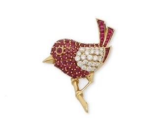 1059
A Ruby And Diamond Bird Brooch
18k yellow gold
The body of the bird entirely set with cabochon and round rubies, totaling approximately 4.25cts, and further set with a pave diamond set wing of round diamonds, totaling approximately 1.15cts
1.5" L x 1.1" W
10.8 grams
Estimate: $1,000 - $1,500