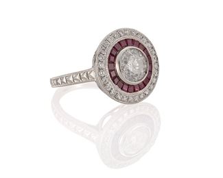 1060
A Diamond And Ruby Ring
Platinum
Centering a full-cut round diamond, weighing 1.54cts and graded I-J color and I2 clarity, surrounded by twenty-eight full-cut round diamonds, totaling approximately .4cts and graded H-I color and SI clarity, and twenty baguette-cut rubies, totaling approximately 1ct
Ring size: 7.5
11.25 grams
Estimate: $4,000 - $6,000