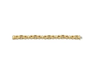 1062
A Gold Link Bracelet
18k yellow gold, stamped: JBS
Designed as a matte finished geometric bracelet
7" L
57.9 grams
Estimate: $2,000 - $3,000