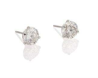 1065
A Pair Of Diamond Stud Earrings
14k white gold
Set with two full-cut round diamonds, weighing 1.52cts and 1.57cts and graded F-G color and SI2 clarity
1.43 grams
2 pieces
Estimate: $8,000 - $12,000