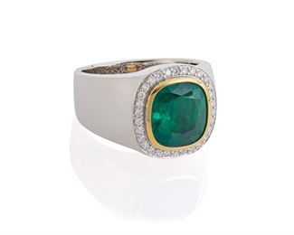 1082
An Emerald And Diamond Ring
18k white and yellow gold
Centering a cushion-cut emerald, gauged at approximately 4.95cts and surrounded by thirty full-cut round diamonds, totaling approximately .3cts and graded G-H color and VS clarity
Ring size: 10
13.35 grams
Estimate: $4,000 - $6,000