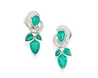 1083
A Pair Of Emerald And Diamond Ear Pendants
Platinum
Set with eight pear-shaped emeralds, totaling approximately 12.5cts, further set with thirty tapered baguette-cut diamonds, totaling approximately 2cts and graded G-H color and SI clarity
1.5" L x .5" W
20.1 grams
2 pieces
Estimate: $6,500 - $7,500