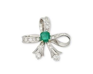 1084
A Moboco Emerald And Diamond Ribbon Brooch
Platinum and 18k yellow gold, stamped: Moboco
Centering a rectangular-cut emerald gauged at approximately 2.55cts., further set with two full-cut round diamonds, totaling approximately 1.25cts, and nineteen full-cut round diamonds, totaling approximately 1.2cts and graded F-G color and VS clarity
2" H x 1.75" W
25 grams
Estimate: $4,000 - $6,000