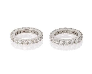 1086
A Pair Of Diamond Eternity Bands
Platinum
Each set with eighteen full-cut round diamonds, totaling thirty-six and approximately 6.5cts and graded F-G color and VS clarity
Ring size: 6.5 and 6.75
15.2 grams gross
2 pieces
Estimate: $4,000 - $6,000